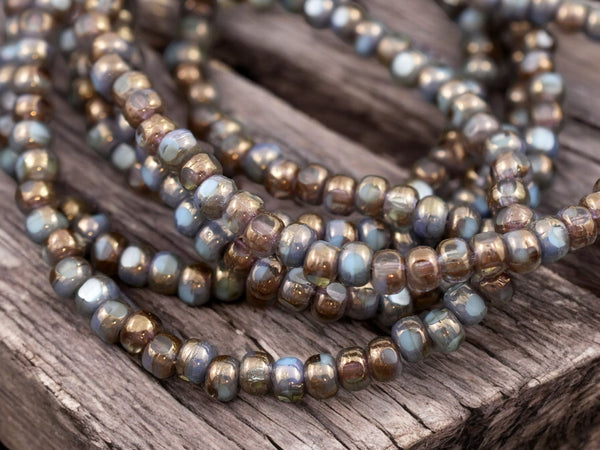 *50* 4x3mm Bronze Washed Sky Blue Crystal Trica Beads