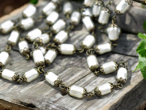 10x5mm Czech Glass White Pearl Chain with Antique Bronze Caps -- Sold by the foot