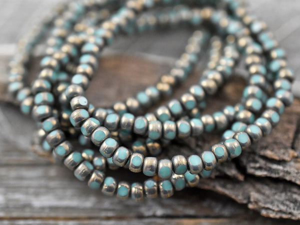 *50* 4x3mm Bronze Washed Turquoise Trica Beads