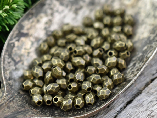 *250* 4x3mm Antique Bronze Faceted Oval Spacer Beads