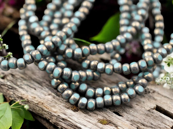 *50* 4x3mm Bronze Washed Turquoise Trica Beads