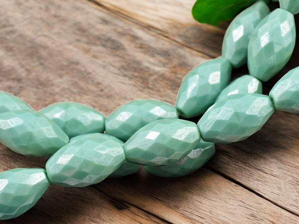 *6* 12x20mm Opaque Turquoise Luster Faceted Oval Fire Polished Beads