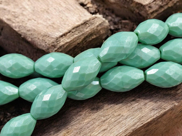 *6* 12x20mm Opaque Turquoise Luster Faceted Oval Fire Polished Beads