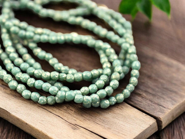 *50* 3mm Gold Washed Etched Sea Green Fire Polished Round Beads