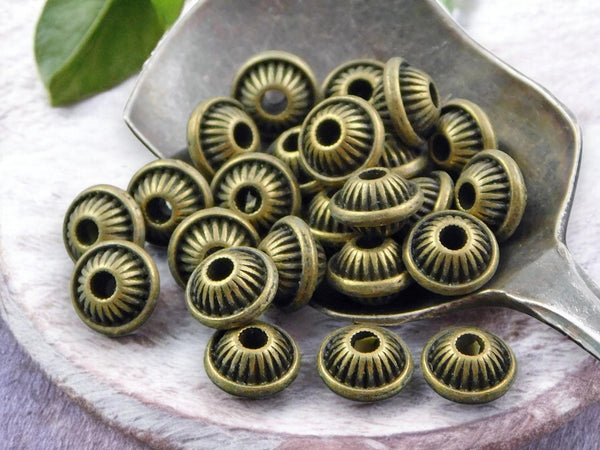 5x7mm Antique Bronze Bicone Spacer Beads