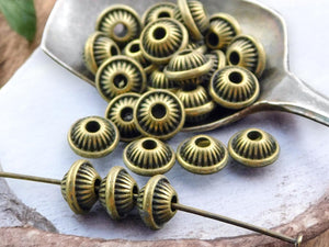 5x7mm Antique Bronze Bicone Spacer Beads