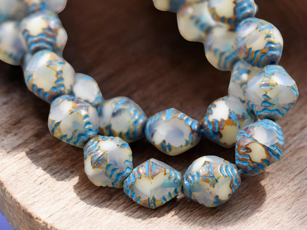 *15* 10x8mm Turquoise Washed White Opal Picasso Faceted Bicone Beads